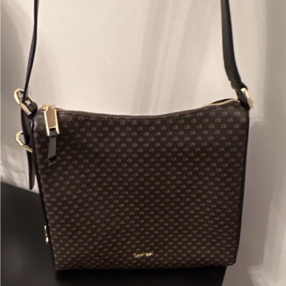 Calvin Klein Handbags - Calvin Klein Brown Monogram Crossbody with Gold Accents